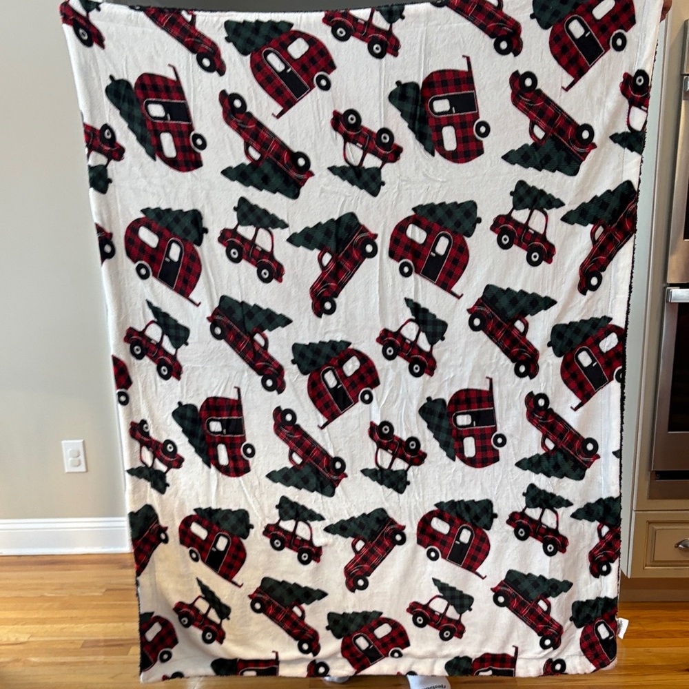 Cozy Holiday Blanket with Red and Black Plaid Design